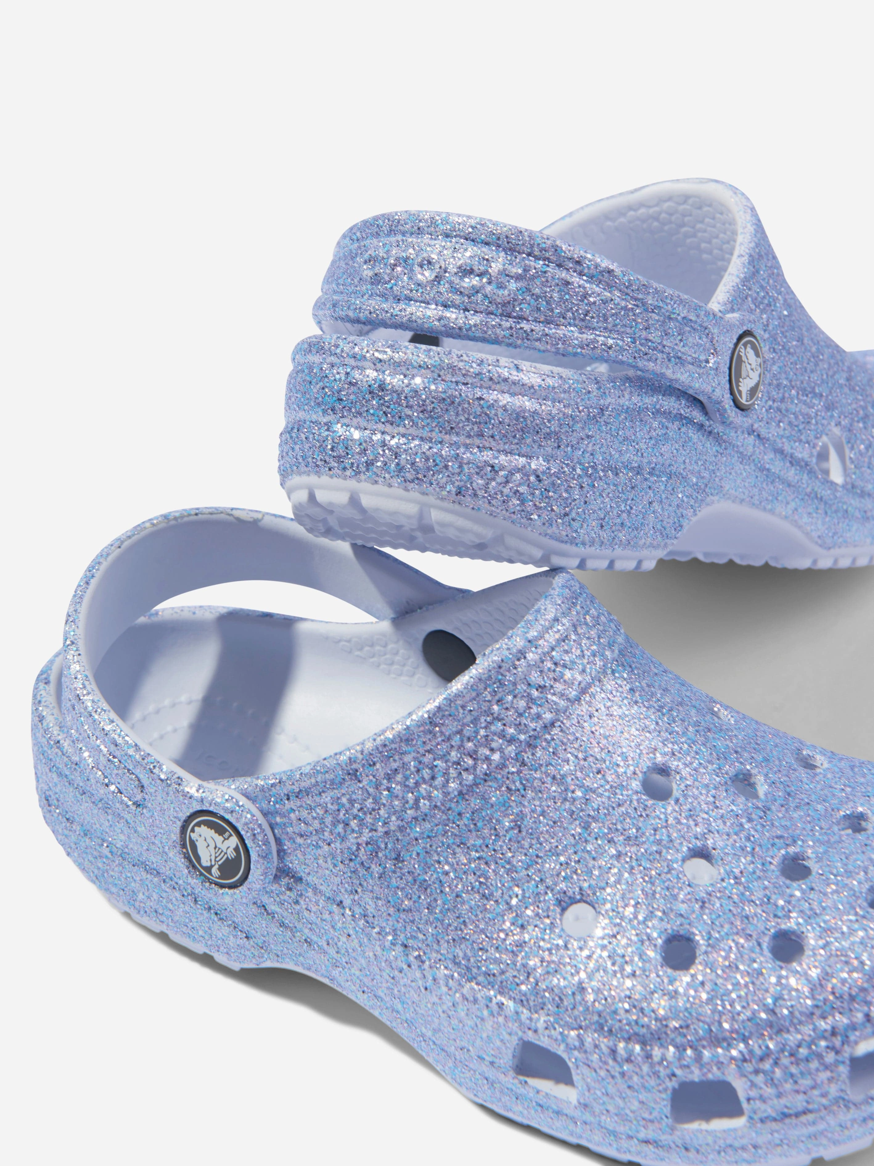 Crocs Girls Classic Glitter Clog in Blue Vinyl, Eco-Friendly Material, Perfectly Balanced