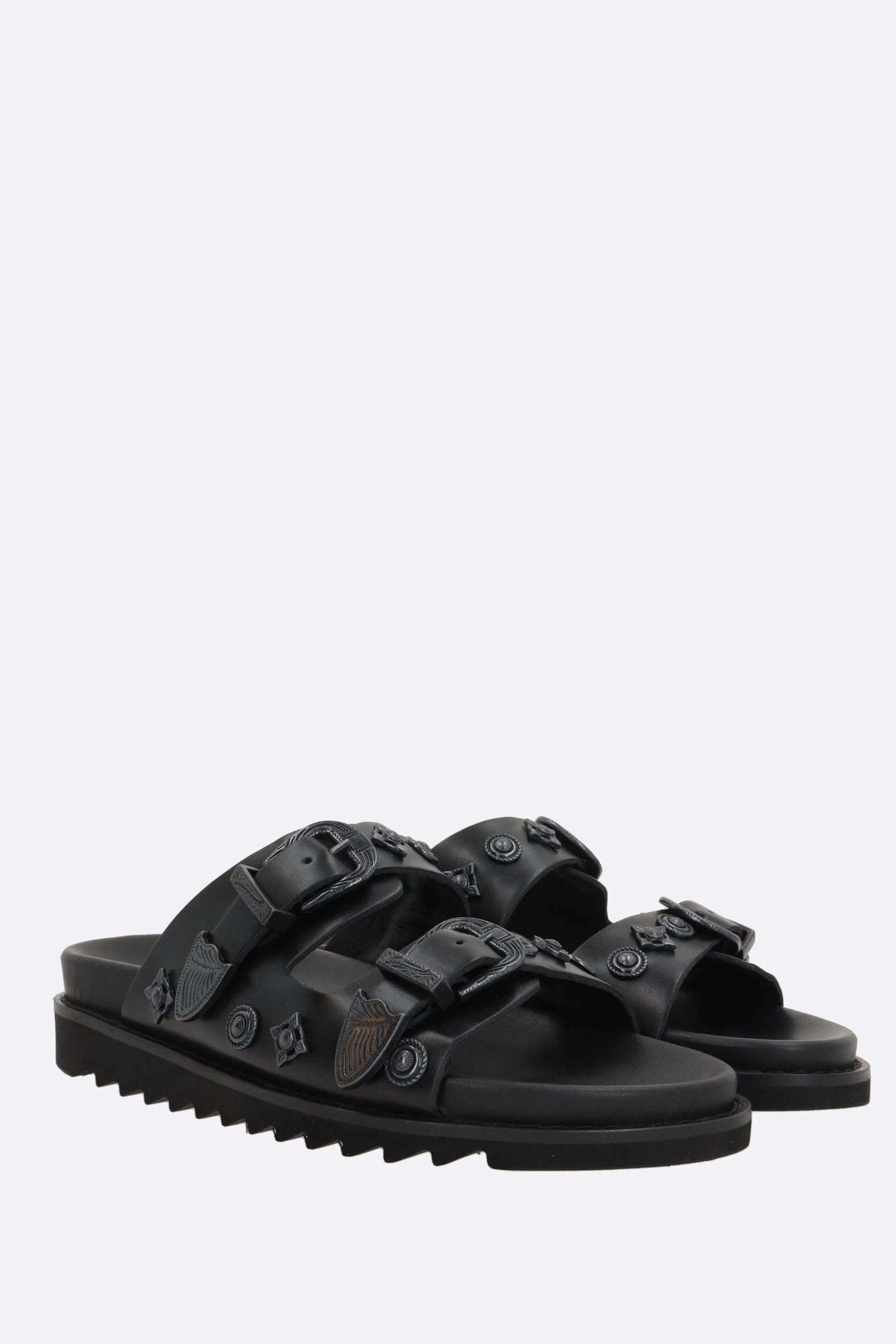 flat sandal in smooth leather with studs