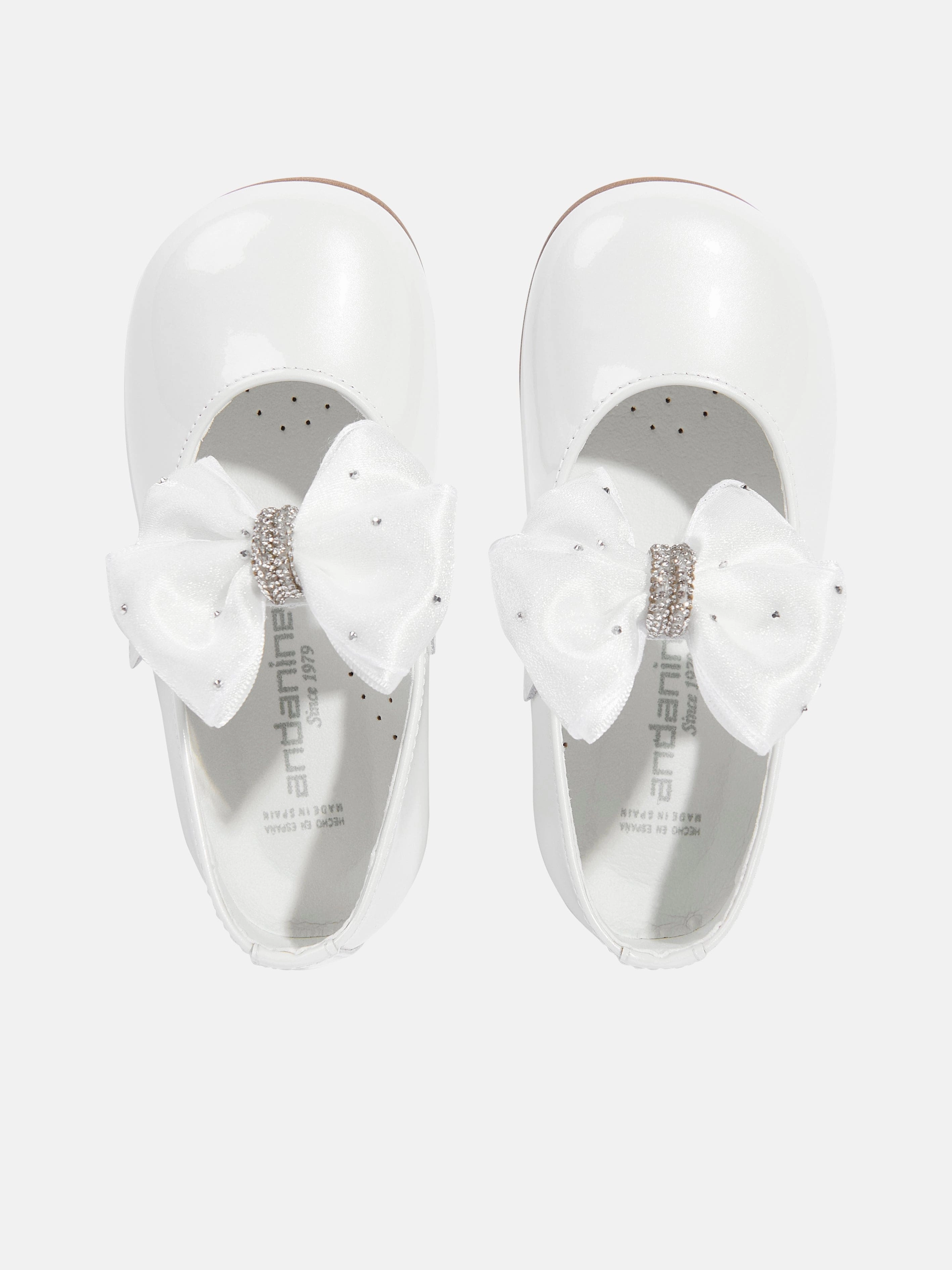 Metallic Leather Andanines Girls Patent Leather Bow Shoes in White