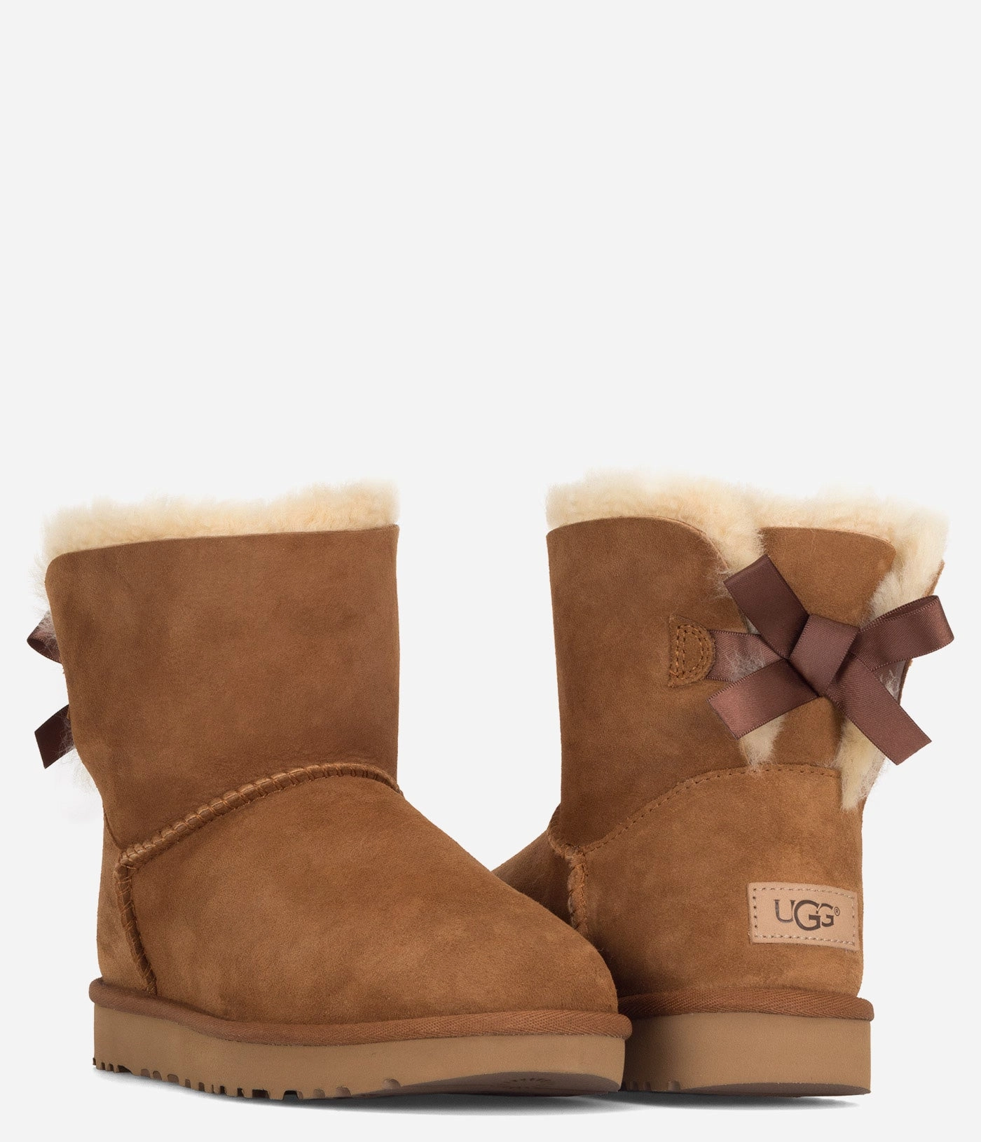 UGG Mini Bailey Bow II Sheepskin Boot - Women Weather-Resistant, Chic & Sleek, Mesh
