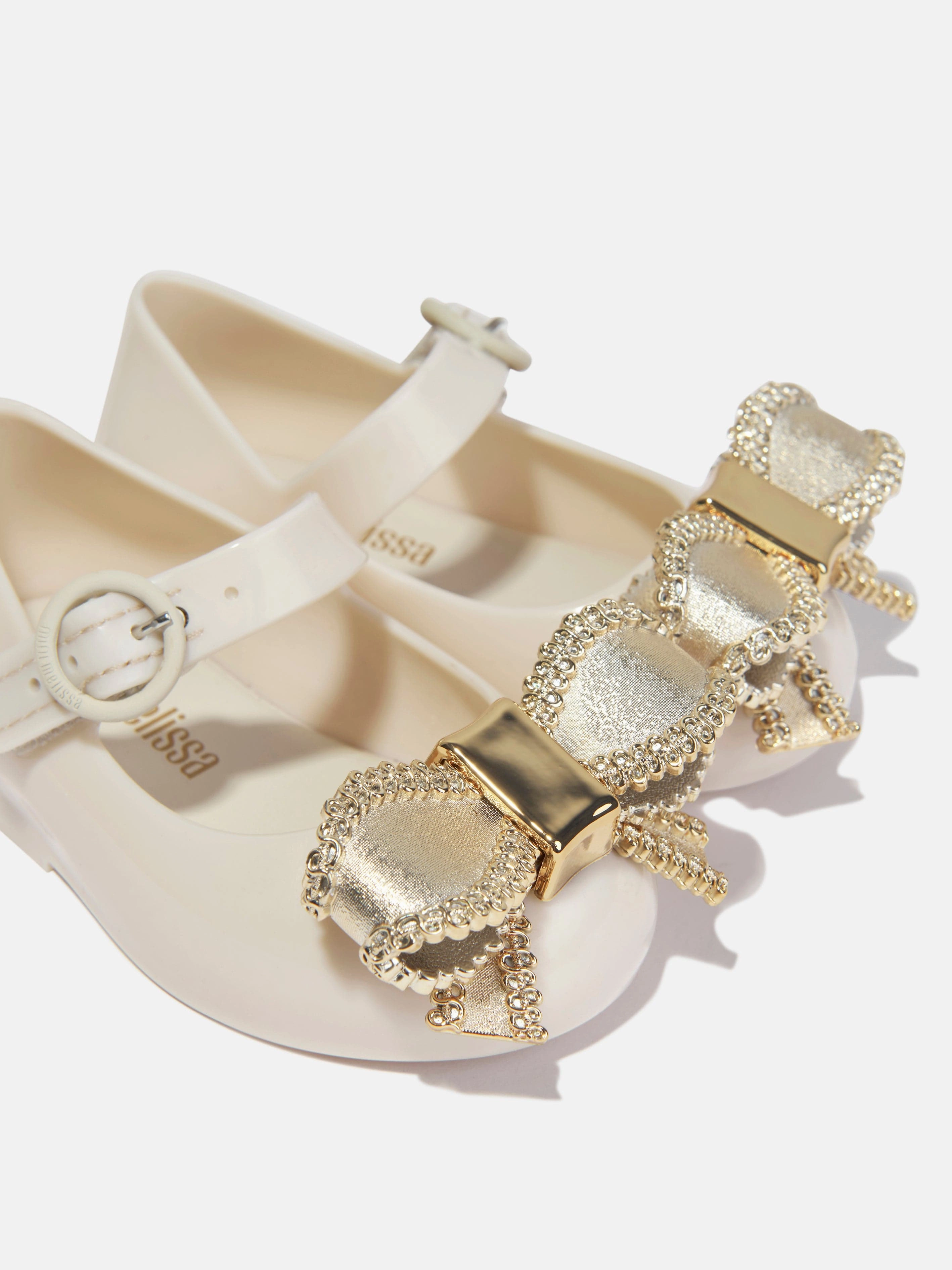 Mini Melissa Girls Mini Sweet Love Bow Jelly Ballerinas in Beige Browse & Buy