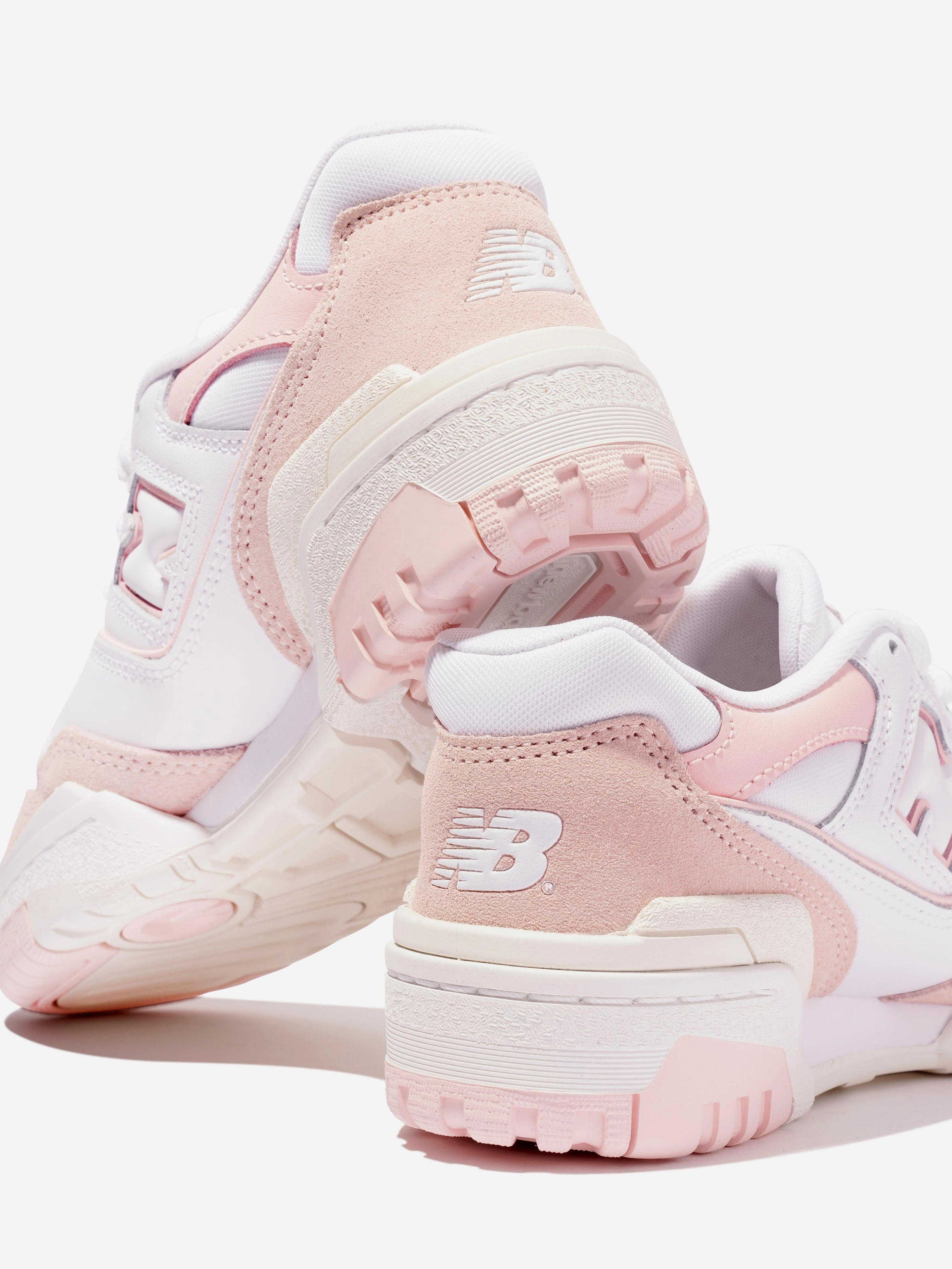 Oversized New Balance Girls 550 Logo Trainers in Pink
