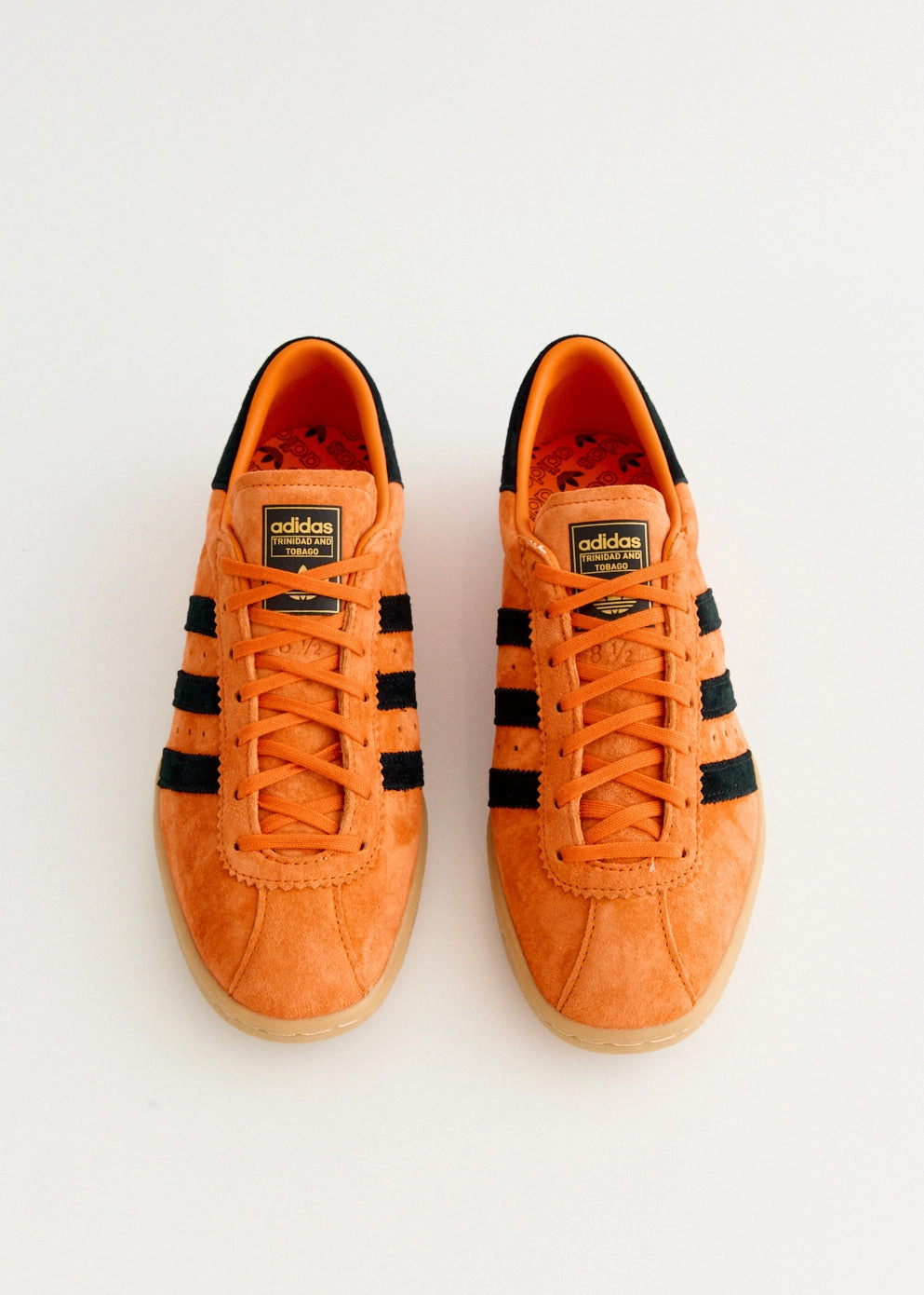 Designed For Movement Trinidad and Tobago 'Orange' Sneakers Bold And Unique