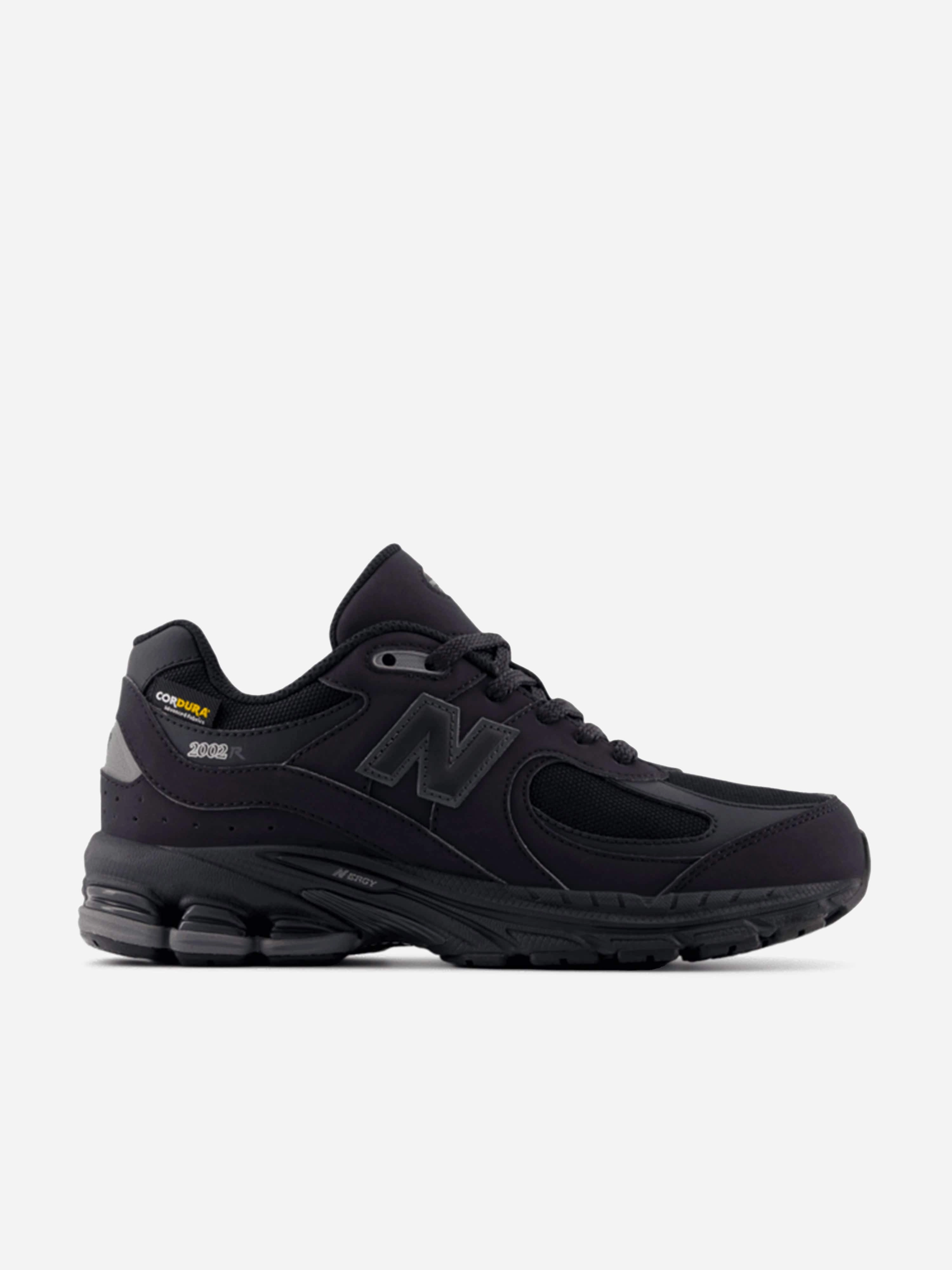 Tailored Design Kids 2002 Trainers in Black Restricted deal Now Trending