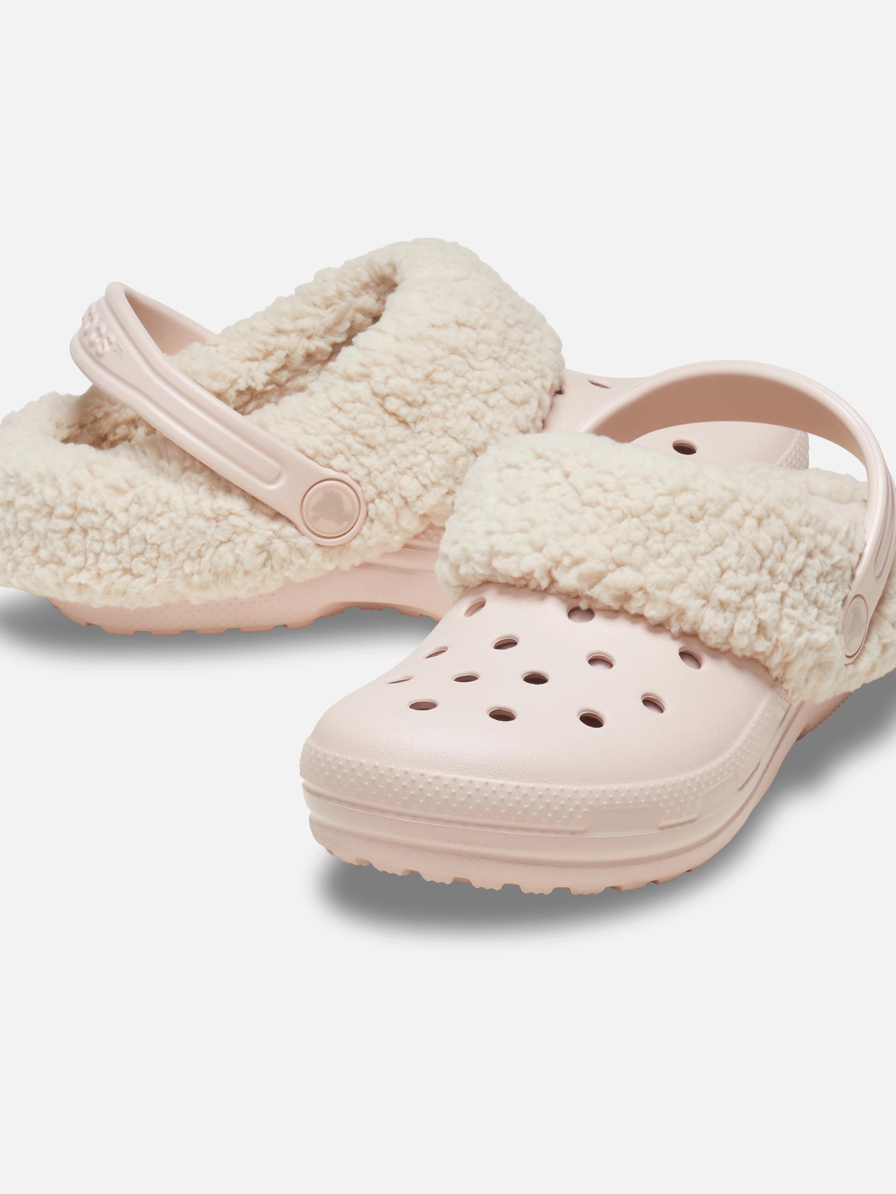 Compact Crocs Girls Classic Blitzen IV Clog in Pink
