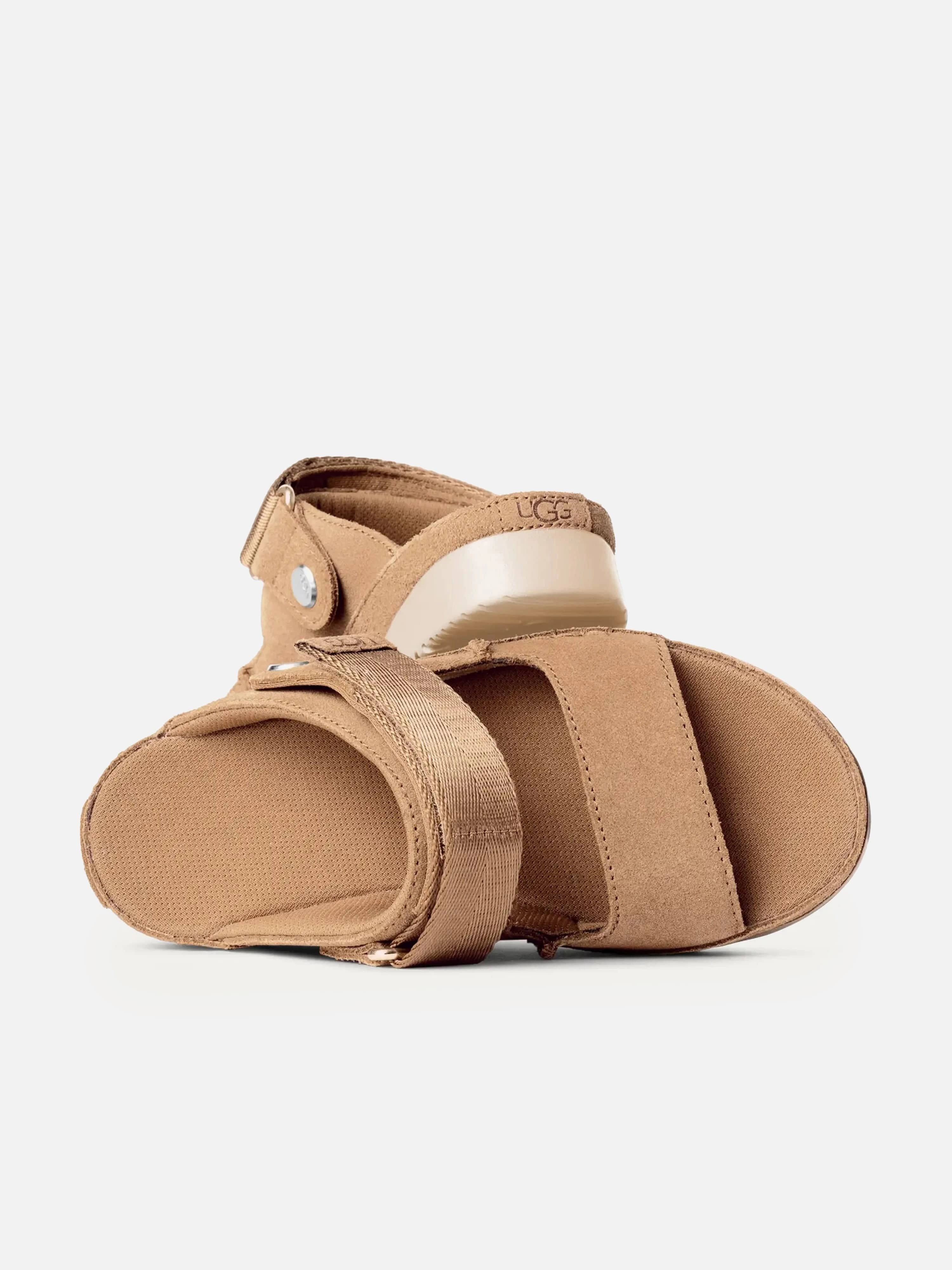 UGG Girls Goldenstar Glide Sandals in Beige Start Shopping Now, Designed For Movement, Embossed Leather